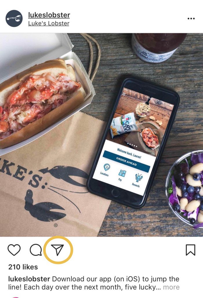 Luke Lobster's Instagram post shows a lobster roll and a iPhone on a table.