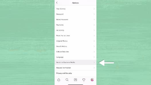Sue B Zimmerman scrolls down to Instagram settings to select “switch to business account.”