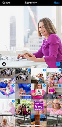 Multiple photos are selected for Sue B Zimmerman's Instagram carousel post with the primary picture featuring her sitting at her desk smile confidently at her computer while wearing a purple blouse.