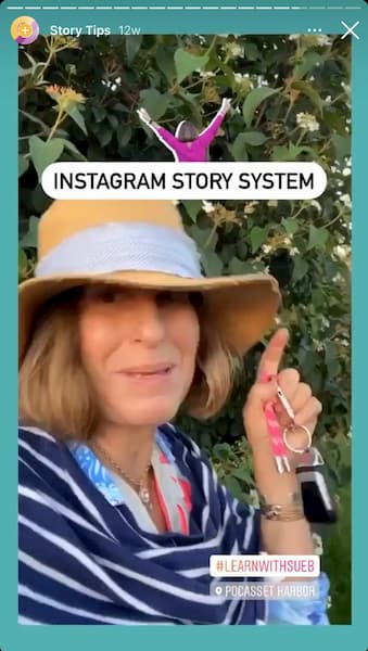 Sue B Zimmerman shares an Instagram Story that shows her wearing a straw hat and striped top as she points to text that says Instagram Story system.